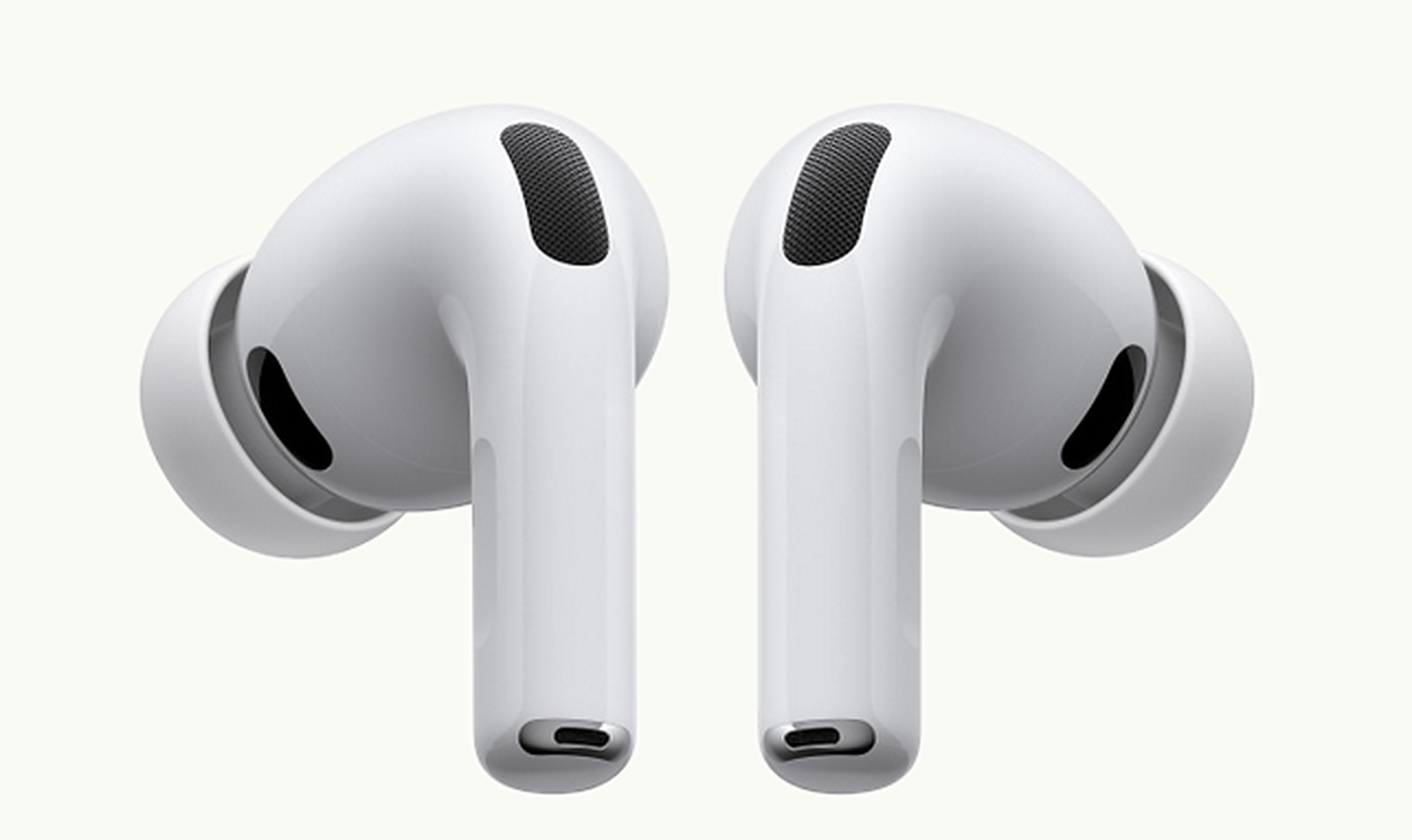 AirPods Pro on soft off-white background with orange accent